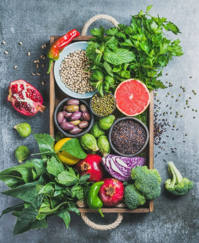 a variety of fruits and vegetables in a crate